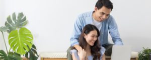 Asian couple applying for a Home Equity Line of Credit online